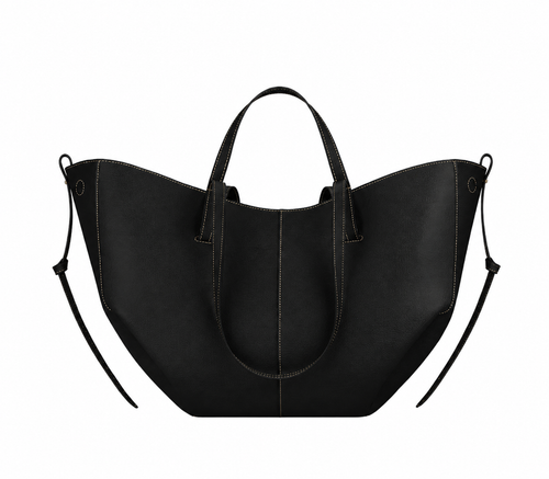 Le Calice — sac cabas en cuir coloris Noir, porté à l'épaule